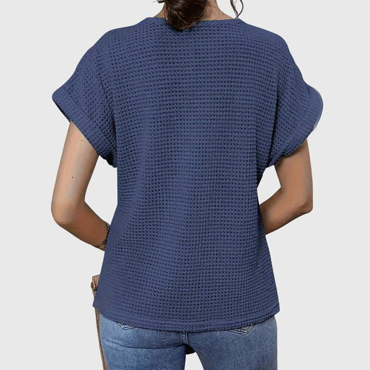 Lightweight & feminine women's lace blouse, offering an elegant Ibiza style for warm weather.