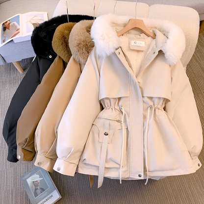 Warm women's elegant winter coat. Stylish outerwear designed for ultimate comfort in cold weather.
