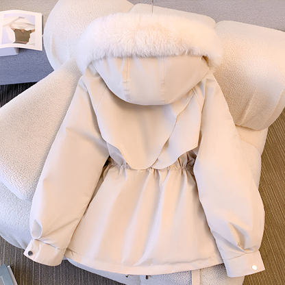 Elegant women's winter jacket, ideal for cold weather. A chic, warm fashion essential.