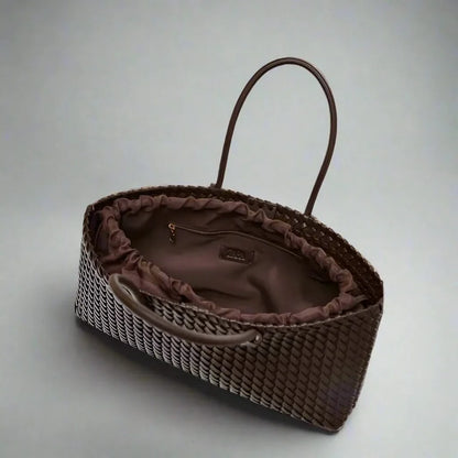 Timeless women's elegant woven leather handbag, a versatile and chic fashion accessory.