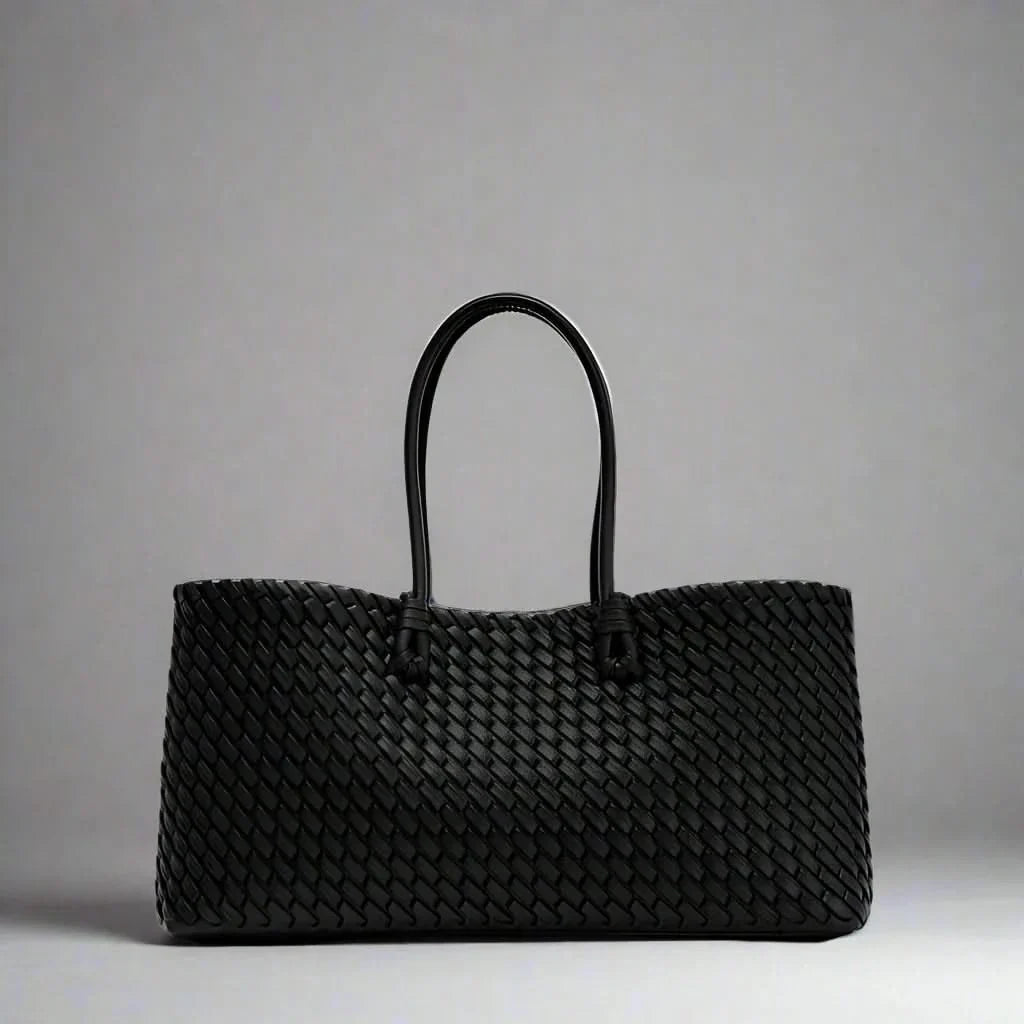 Fashionable women's elegant woven leather handbag, a stylish everyday accessory for her.