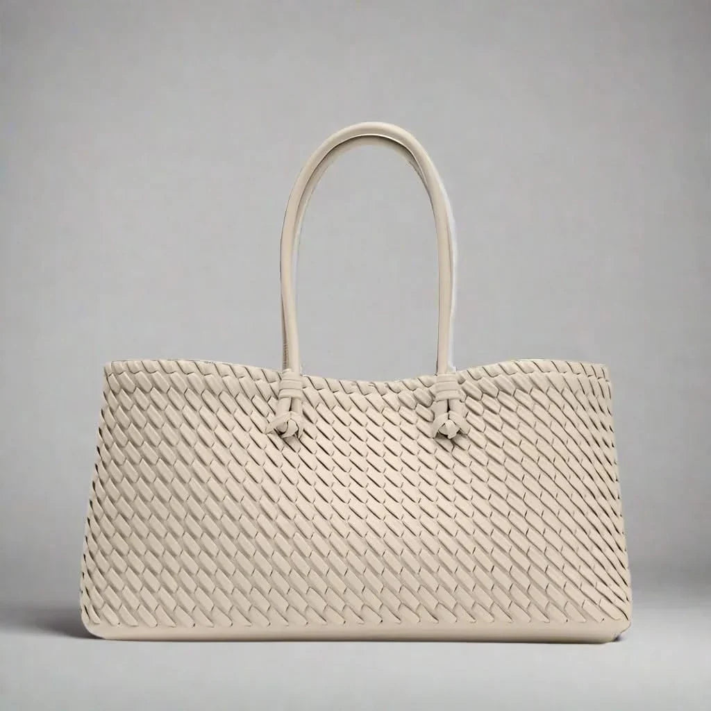 Elegant women's woven leather handbag, a versatile and sophisticated accessory for any look.
