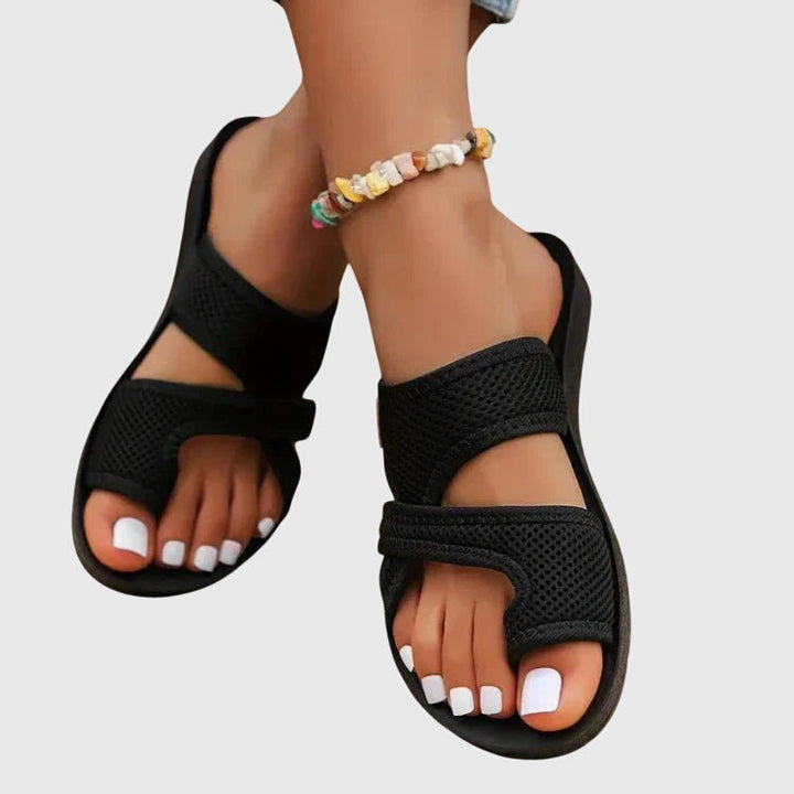 Chic women's platform slip-on sandals, perfect for summer walks and warm weather comfort.