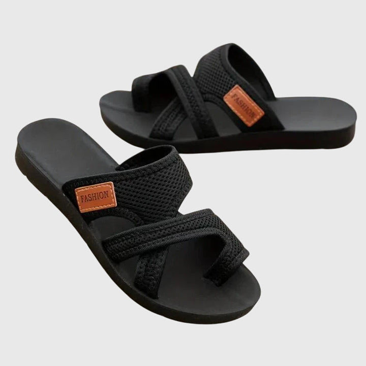 Stylish women's platform slip-on sandals, ideal chic footwear for warm weather and comfort.