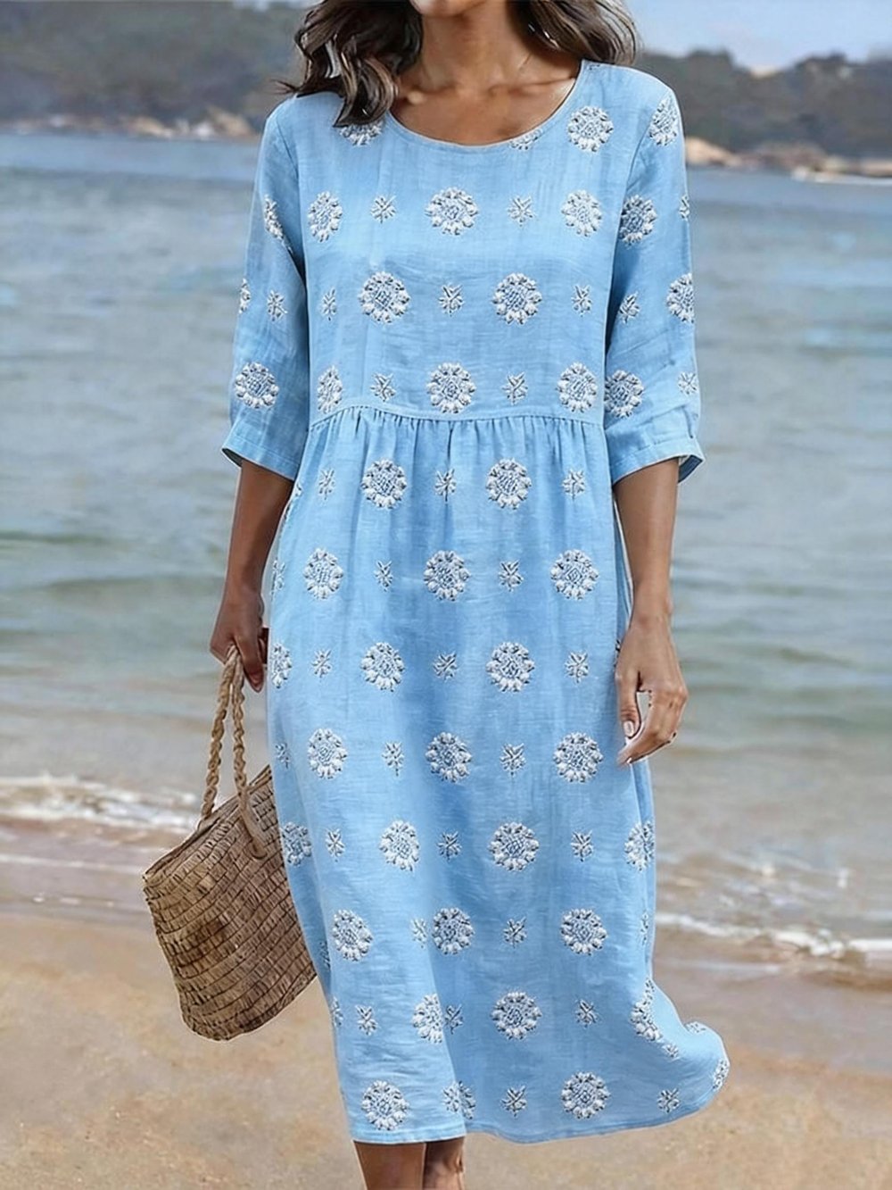 Elegant women's relaxed fit midi dress, featuring delicate floral embroidery. Ideal for spring vacation or day wear.