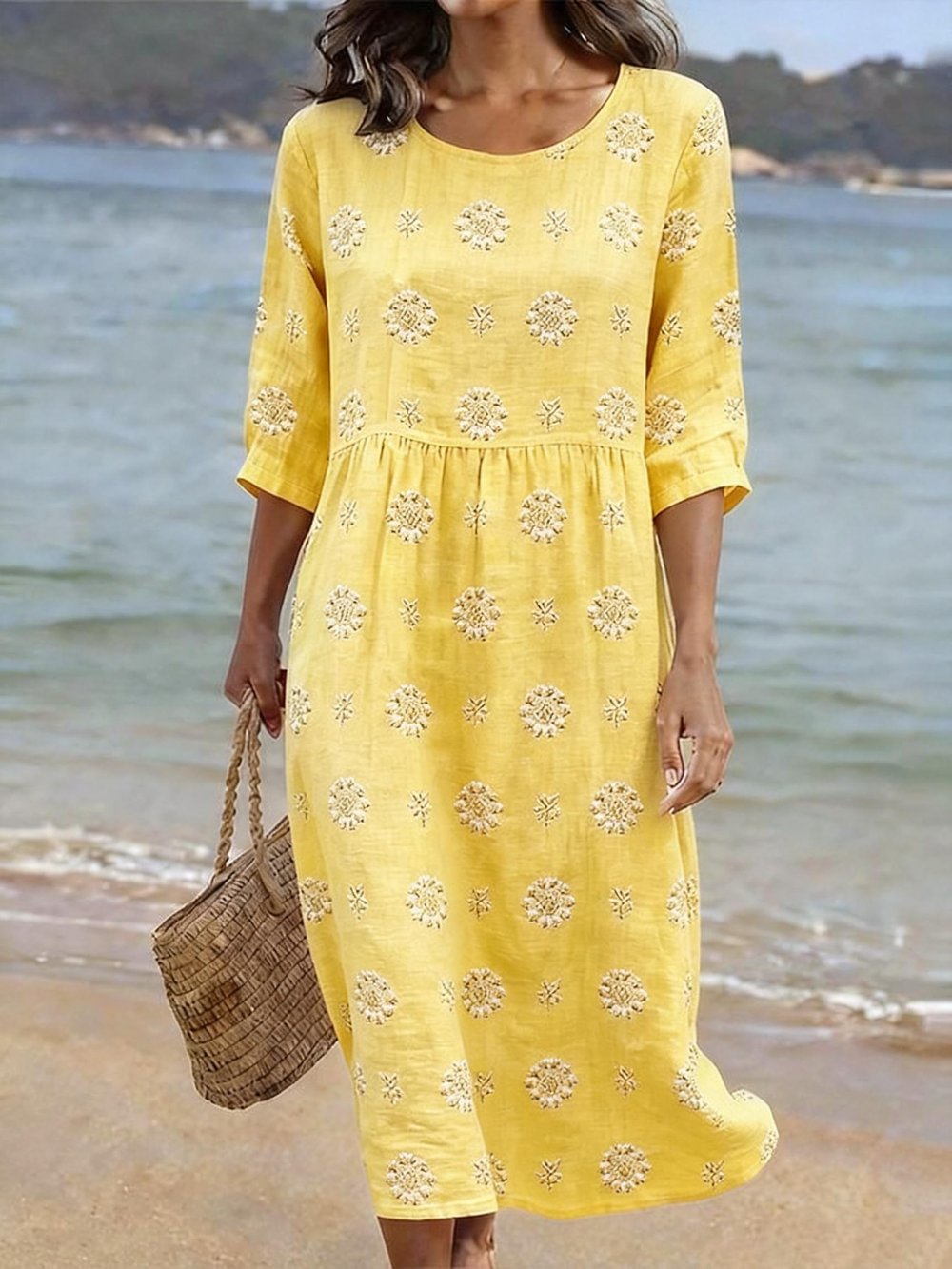 Women's embroidered floral midi dress with three-quarter sleeves & round neck. Versatile for casual or elegant spring.