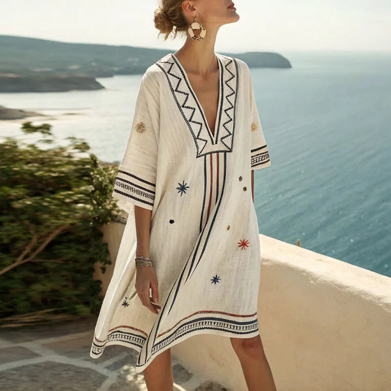 Women's embroidered kimono beach dress with V-neck, ideal as a summer resort wear tunic or swimsuit cover-up.