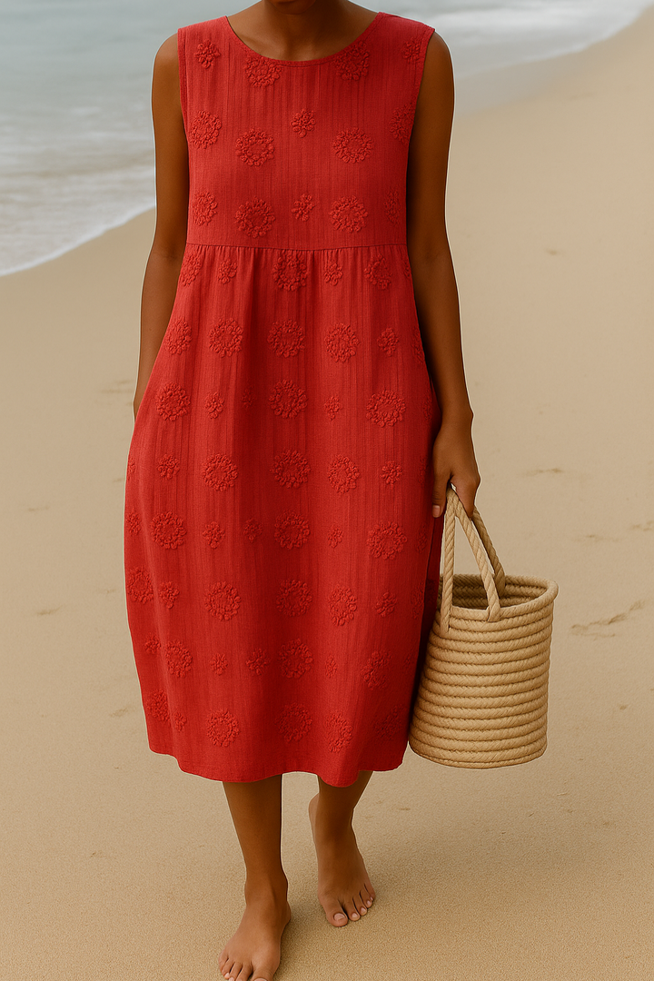 Casual women's summer midi dress, sleeveless and embroidered, offering comfort and chic everyday style.