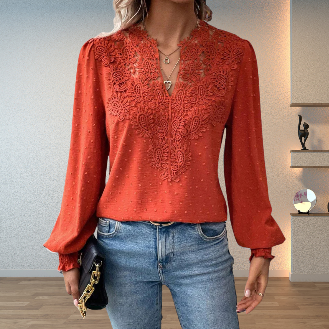 Women's embroidered V-neck long sleeve blouse with elegant floral details, perfect for versatile styling.