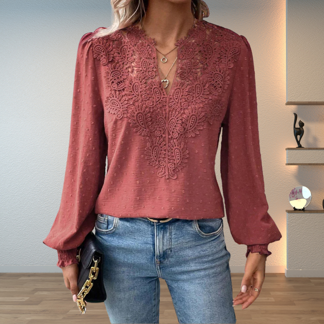 Elegant embroidered V-neck women's blouse with long puff sleeves, offering a sophisticated & comfortable relaxed fit.