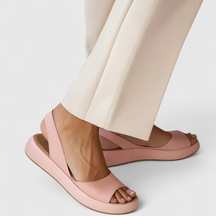 Women's Emrynn orthopedic slip-on sandals with arch support for ultimate comfort.