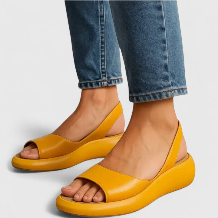 Emrynn women's slip-on orthopedic sandals: cushioned, arch support, comfort footwear for easy wear.