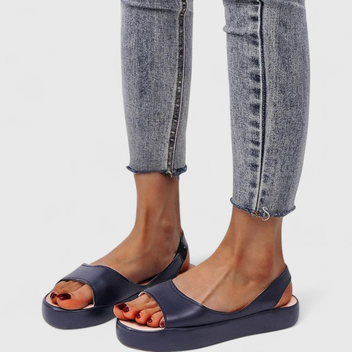 Easy wear Emrynn women's slip-on sandals, orthopedic design provides cushioned comfort & arch support.