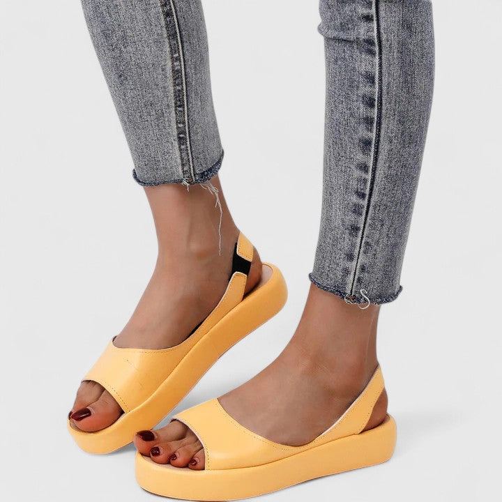Cushioned Emrynn women's slip-on orthopedic sandals, offering superior comfort and arch support.
