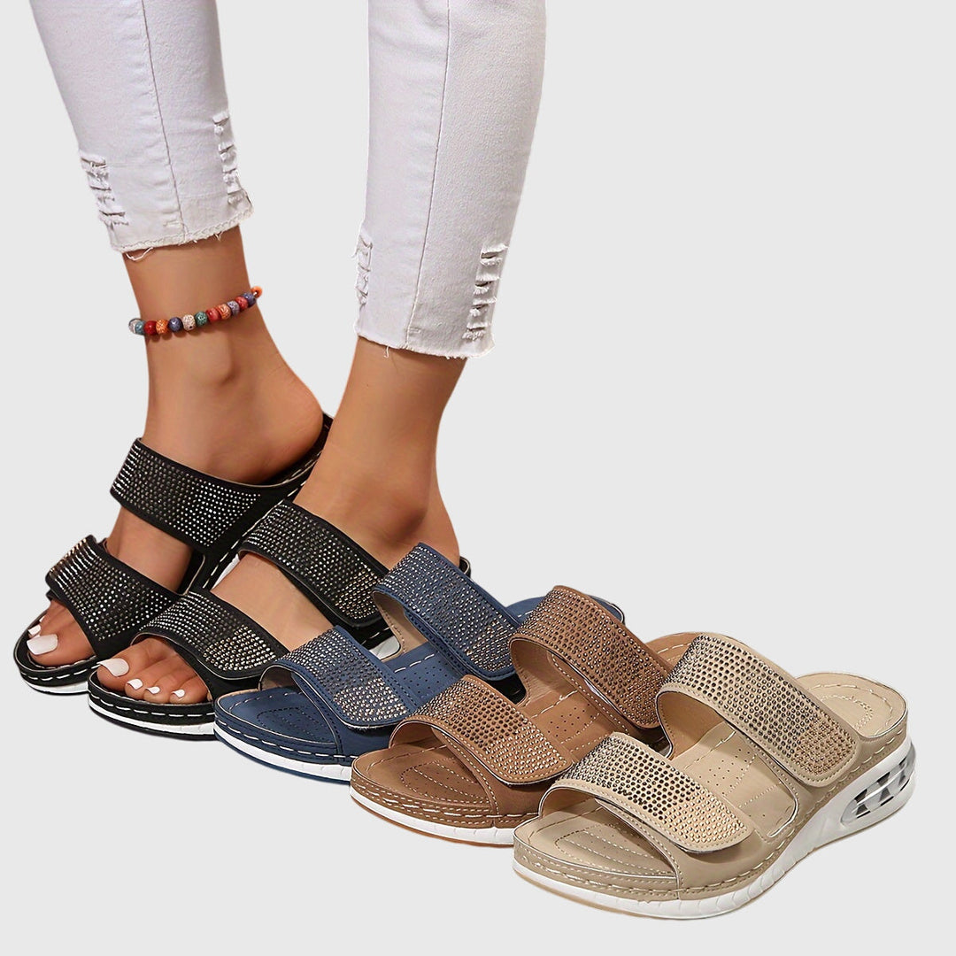 Side view of Ensley women's sandals, showcasing adjustable straps, arch support & breathable design.