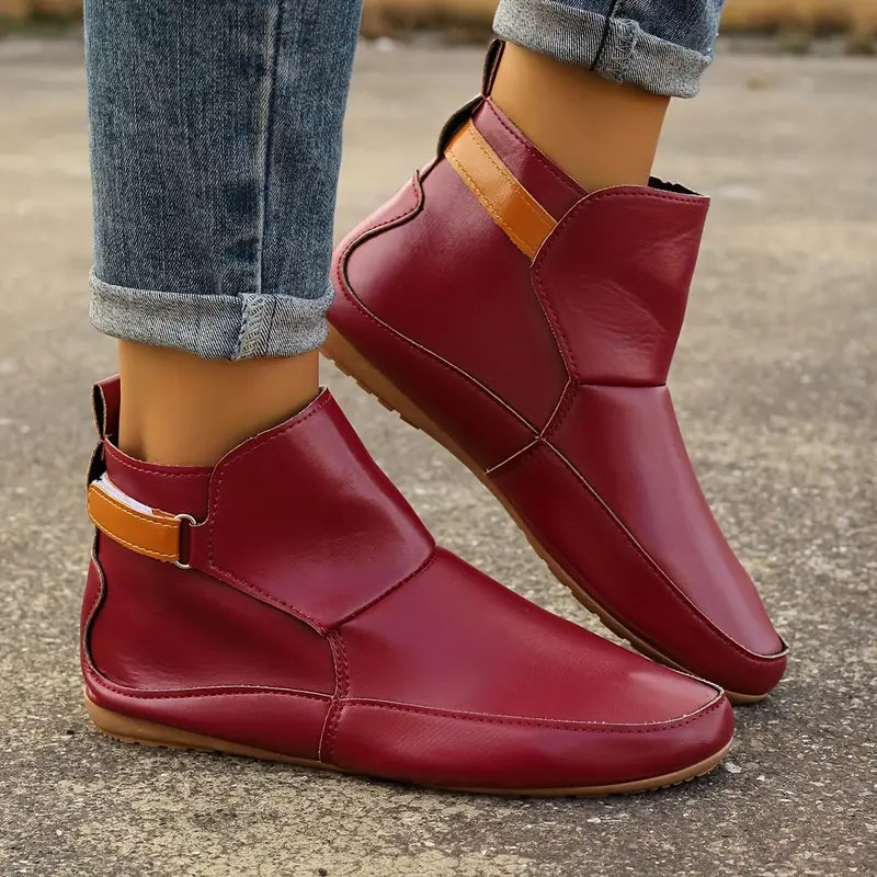 Fashionable & comfortable women's ErgoFit slip-on ankle boots for versatile all-day style.