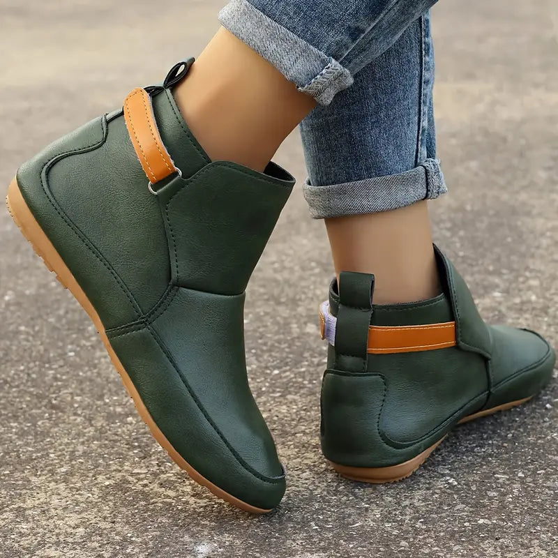 Stylish women's slip-on ErgoFit ankle boots, perfect for versatile everyday fashion.