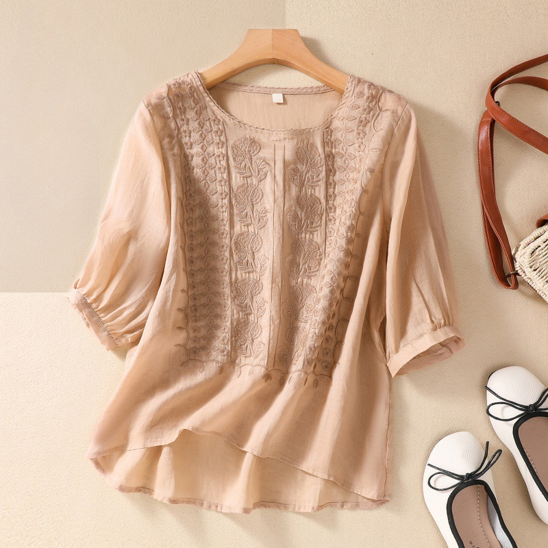 Elegant Esmeralda lace blouse for women, a stylish and relaxed fit top for summer casual wear.