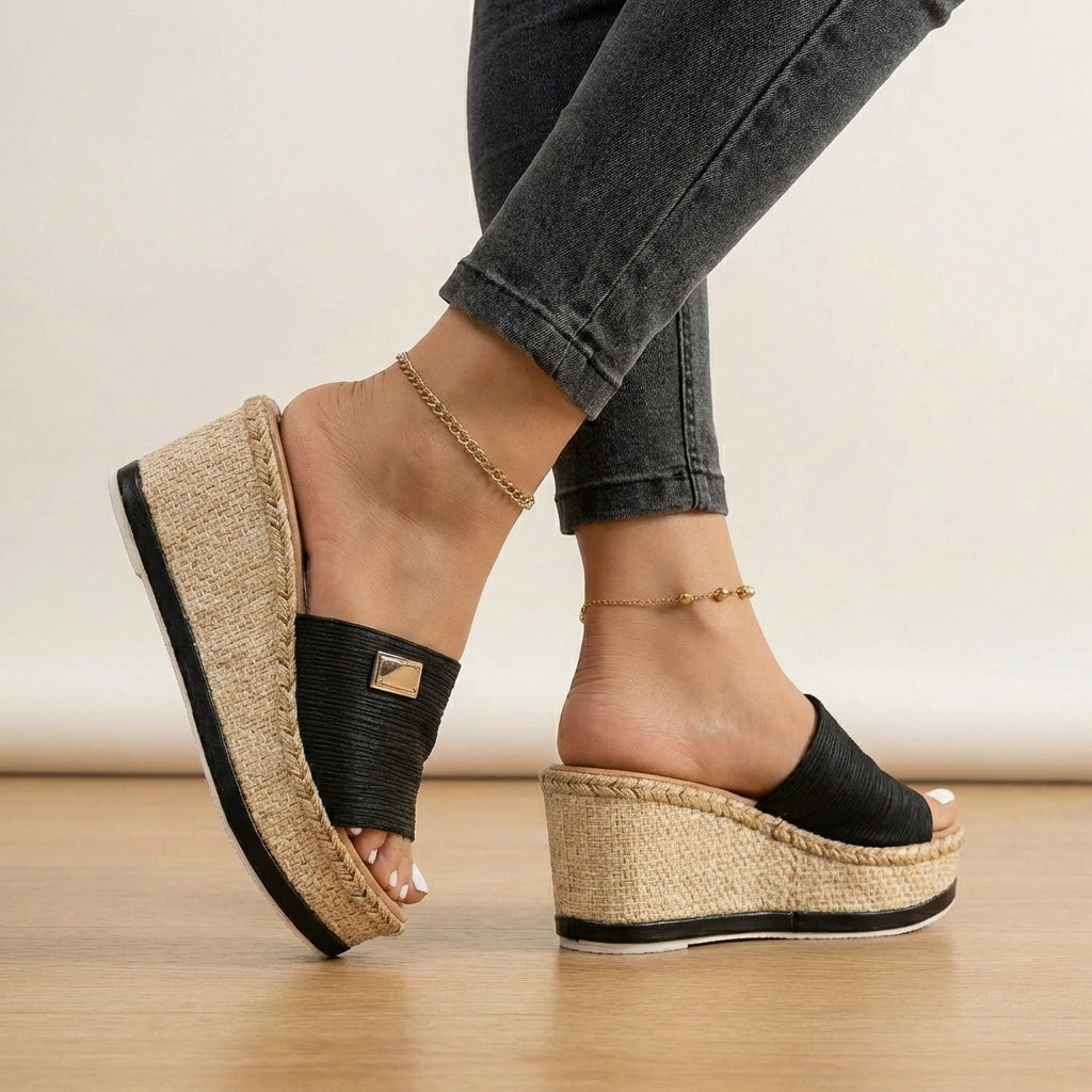 Women's espadrille wedge sandals with textured straps. Perfect for comfortable summer casual wear.