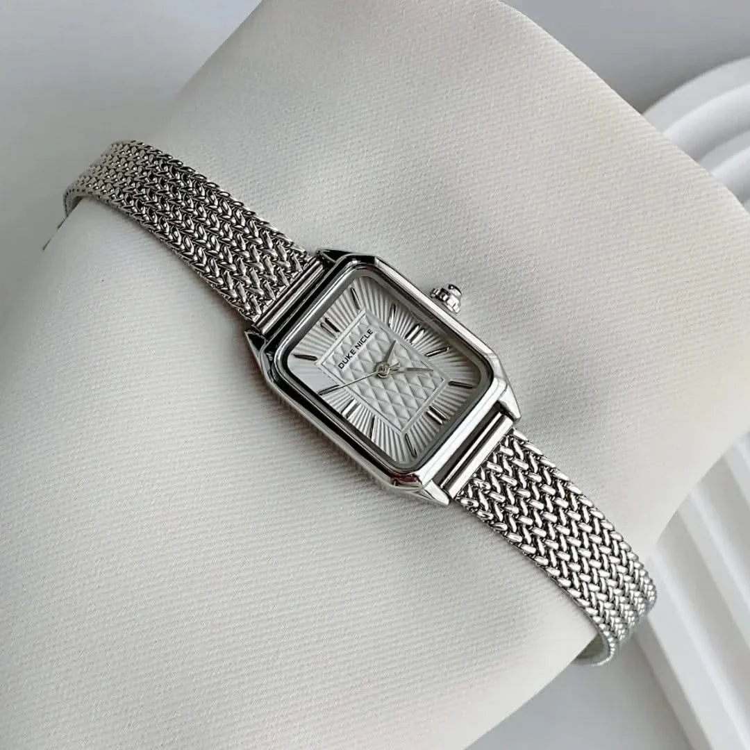 Estella women's elegant daily wristwatch on a wrist, showing the sleek design and comfortable adjustable fit.