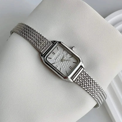 Estella women's elegant daily wristwatch on a wrist, showing the sleek design and comfortable adjustable fit.