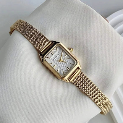 Gold Estella women's wristwatch, an elegant daily accessory, classic timepiece with sleek design. Perfect gift for her.