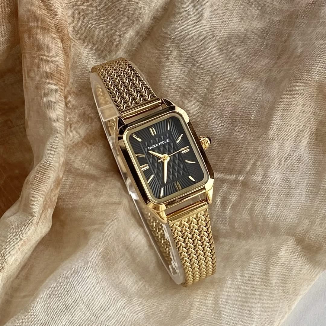 Black Estella women's elegant wristwatch, a classic daily accessory with sleek, adjustable design and timepiece appeal.