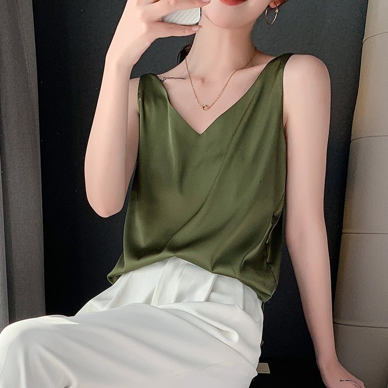 Soft women's relaxed fit tank top. Sleeveless, versatile everyday wear for summer comfort.