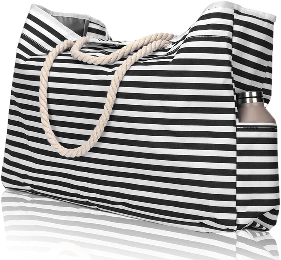 Oversized women's waterproof beach tote with striped pattern. Ideal sandproof travel and utility bag.