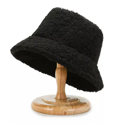 Elegant women's plush bucket hat. Cozy faux fur keeps you warm & adds trendy winter style.