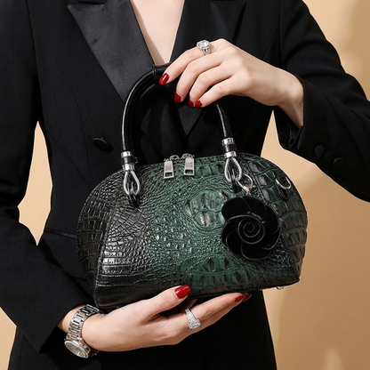 Elegant women's alligator texture fashion handbag, stylish day to night accessory.