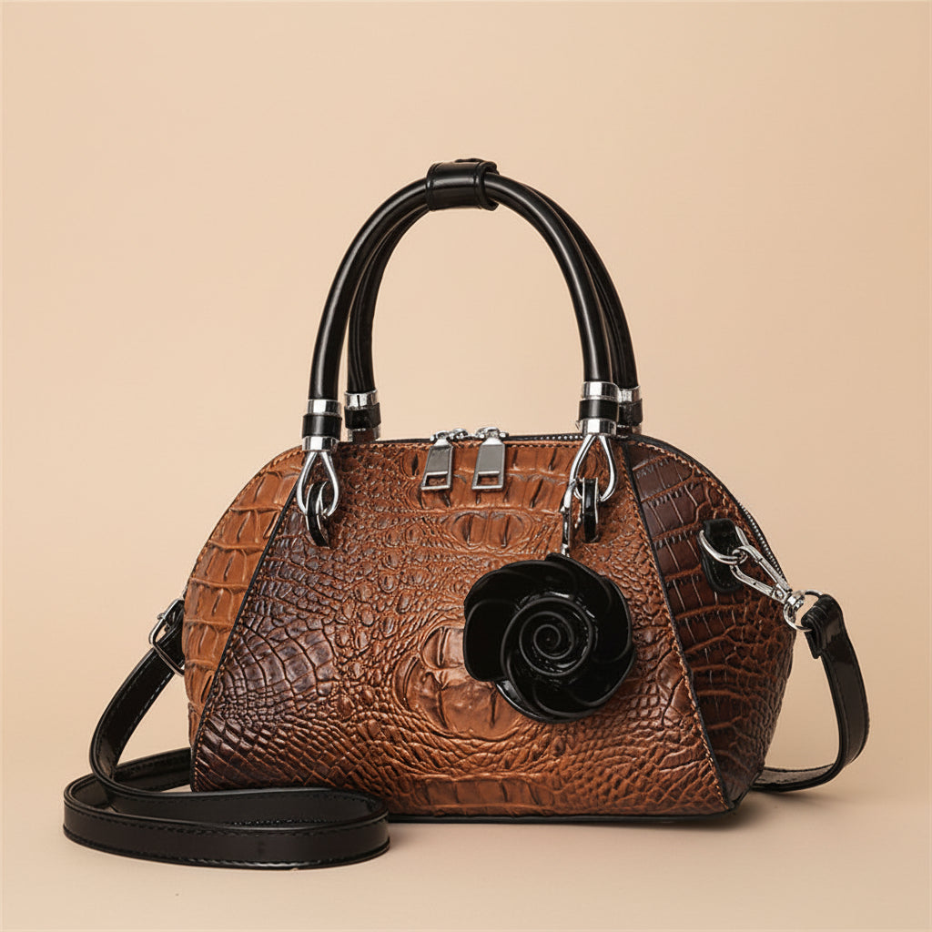 Fashionable women's shoulder bag with alligator texture, chic faux leather design.