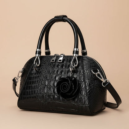 Trendy women's chic alligator-textured purse, a stylish faux leather statement handbag.