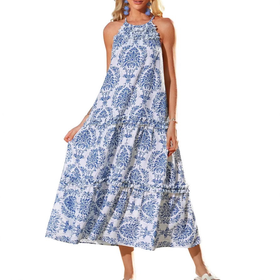 Flowy women's boho tiered maxi dress in chic floral print, ideal as a casual summer or elegant vacation dress.