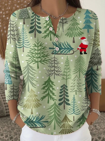 Warm women's winter sweater, cotton blend, with festive button details & a charming snowflake and pine branch pattern.