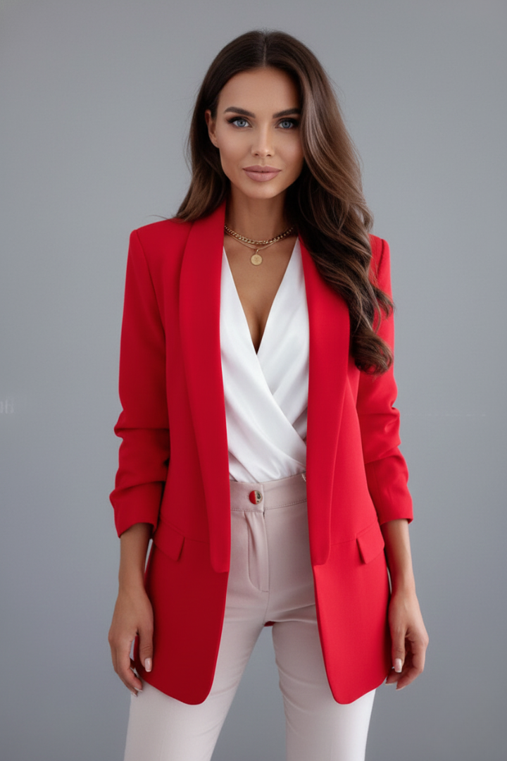 Back view of a women's tailored fitted blazer, highlighting its sleek cut and professional silhouette. Wrap collar design.