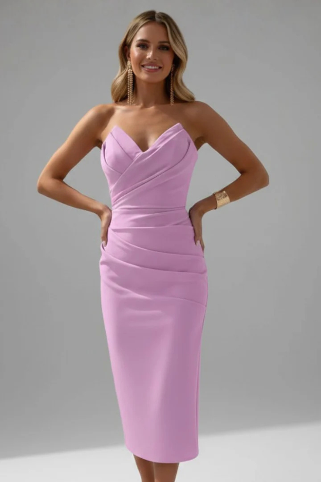 Women's cocktail dress: bodycon ruched midi style with an alluring sweetheart neckline.