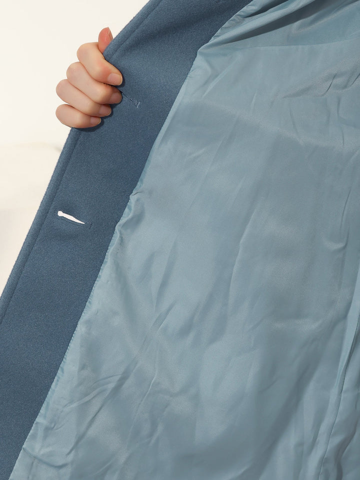 Fitted women's trench coat. Elegant professional jacket with classic button closure & structured collar.