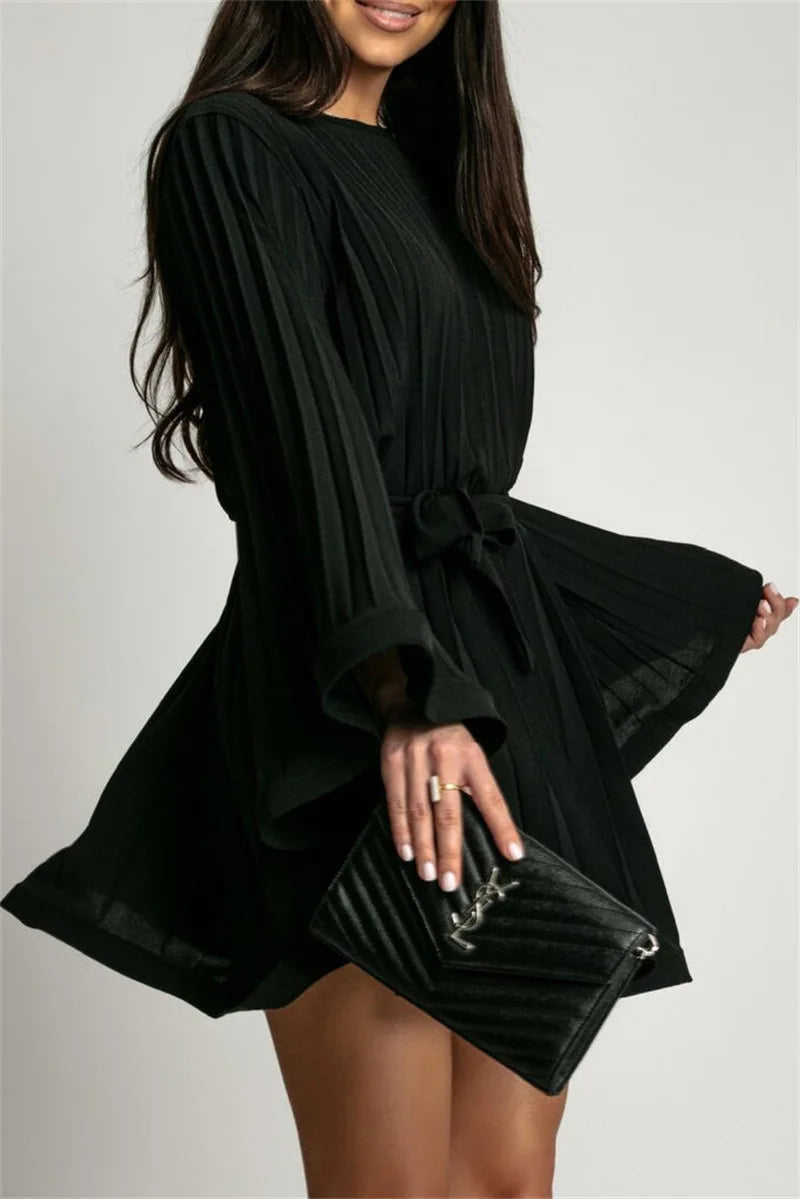Elegant women's A-line mini dress with pleats and graceful flare bell sleeves, sophisticated style.