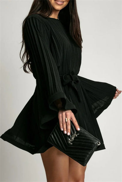 Elegant women's A-line mini dress with pleats and graceful flare bell sleeves, sophisticated style.