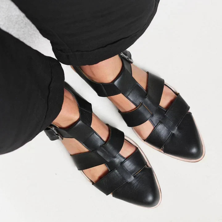 Casual women's flat sandals, perfect for summer walks & daily wear, offering stylish and comfortable footwear.