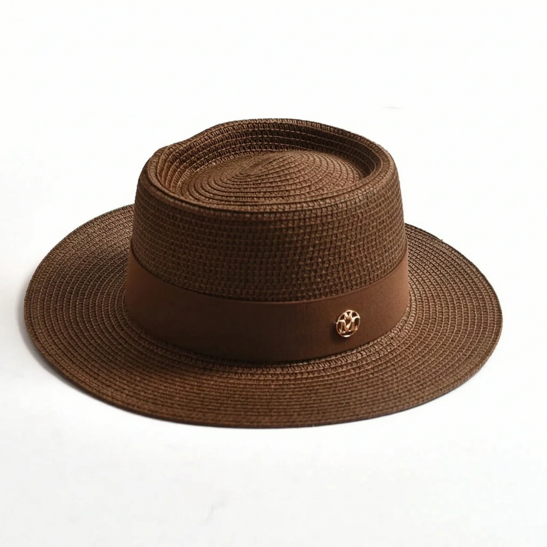 Versatile women's flat top sun hat. Woven wide brim design, essential for beach, travel, and everyday wear.