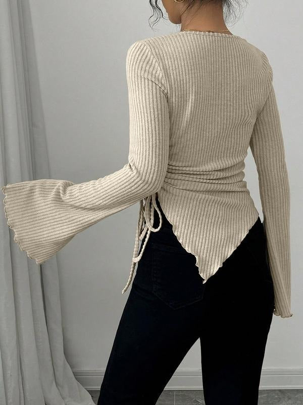 Elegant women's long sleeve knit wrap top with a flattering tie waist and chic flared sleeves for everyday wear.