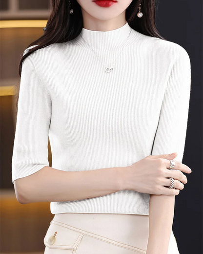Modern ribbed knit long sleeve top for women, a flattering and comfortable casual piece for daily style.
