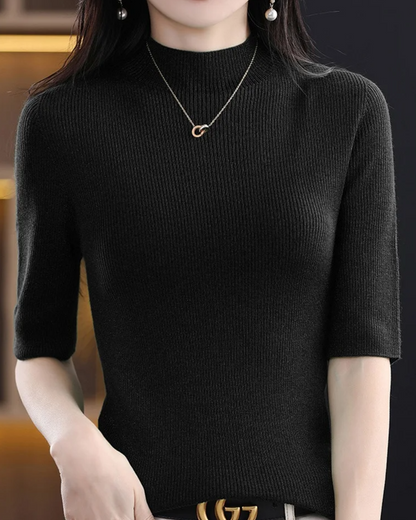 Classic ribbed knit top for women, chic and flattering with long sleeves for comfortable versatile wear.