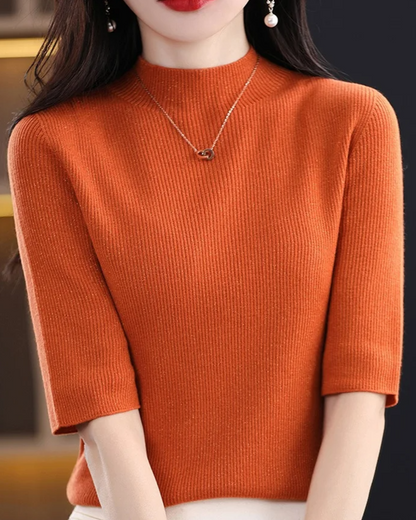 Stylish long sleeve ribbed knit top for women, a comfortable and flattering everyday essential piece.