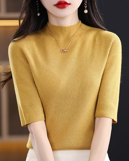 Comfortable women's long sleeve ribbed knit top, perfect for casual or elegant everyday wear.