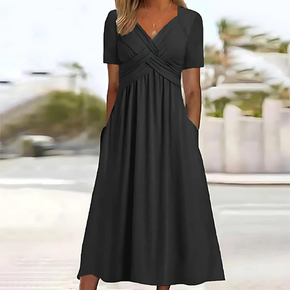 Elegant women's ruched V-neck midi dress with practical pockets, ideal for versatile occasionwear.