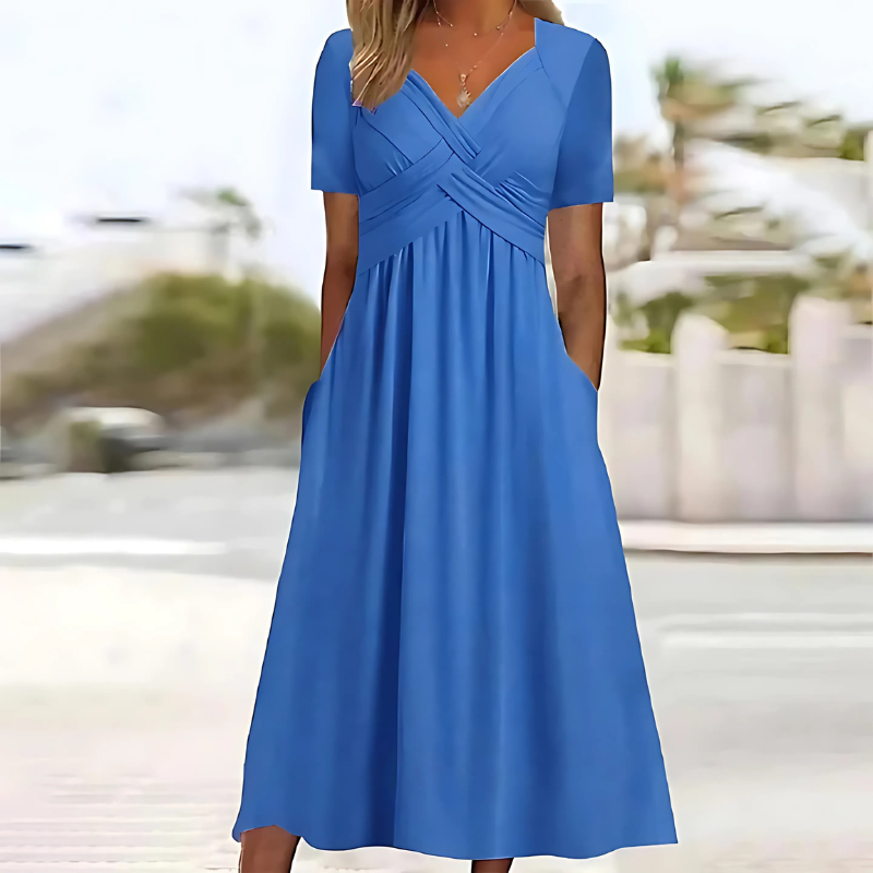 Versatile women's V-neck midi dress, flattering A-line cut, comfortable with convenient pockets.