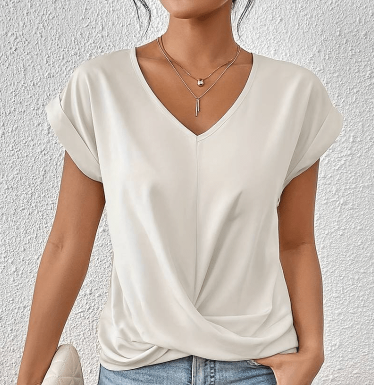 Chic women's V-neck tunic top with flattering fit, a versatile short sleeve wardrobe essential.